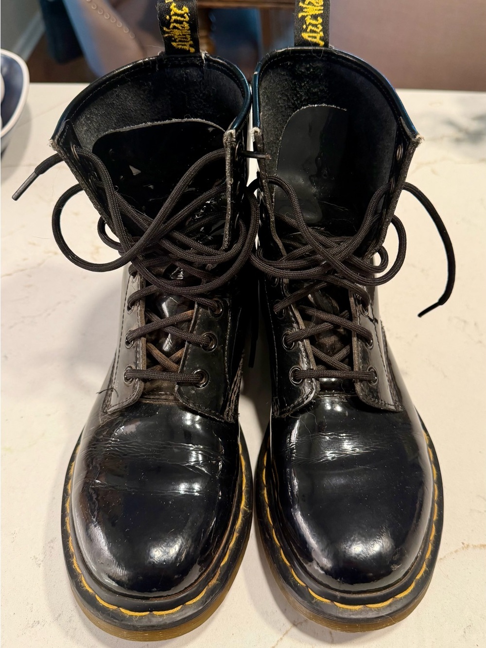 Dr. Martens Black Patent Lace-Up Boots with Yellow Heel Loop